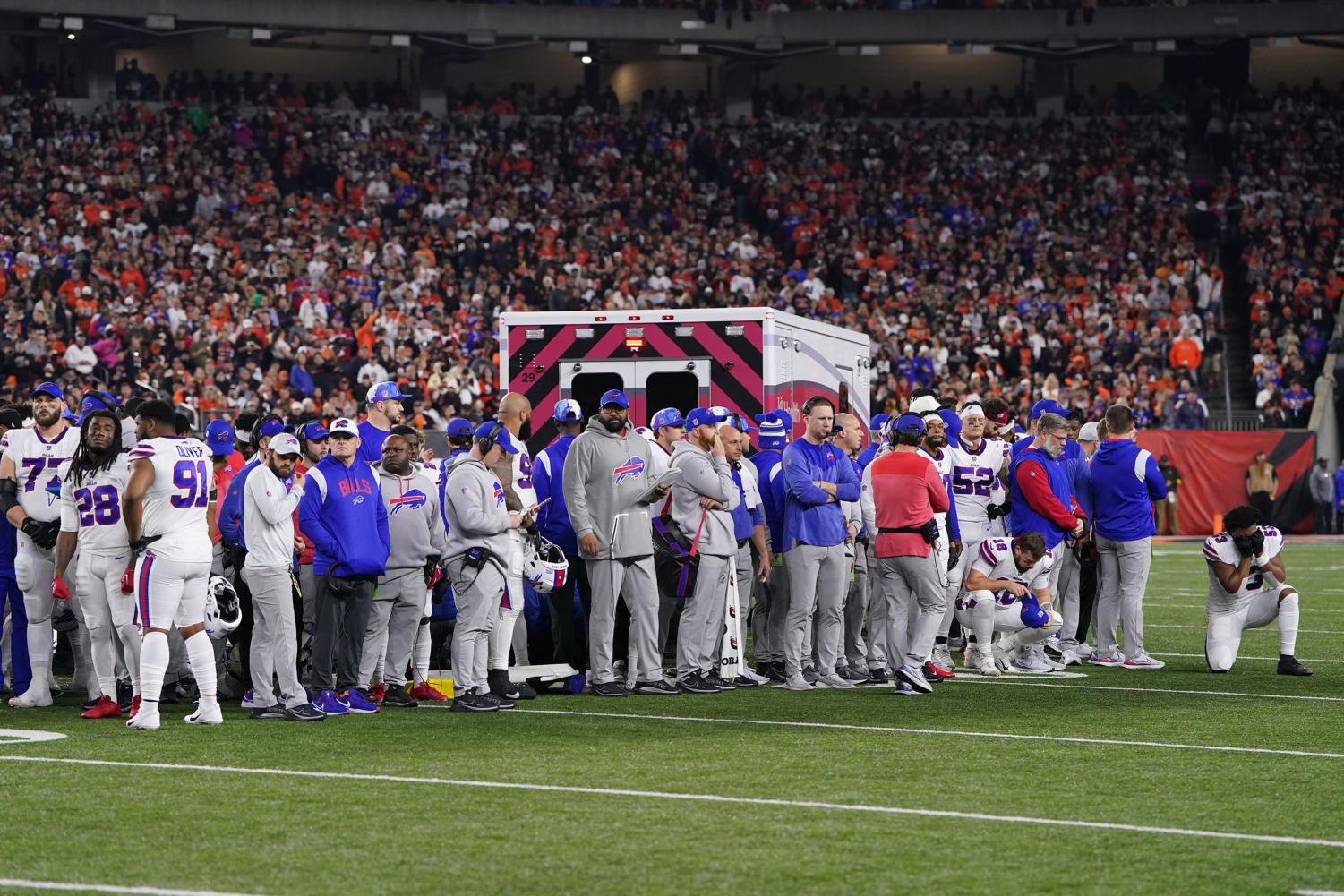 Damar Hamlin shows 'signs of improvement' while still in ICU in critical  condition, Bills say, after mid-game cardiac arrest