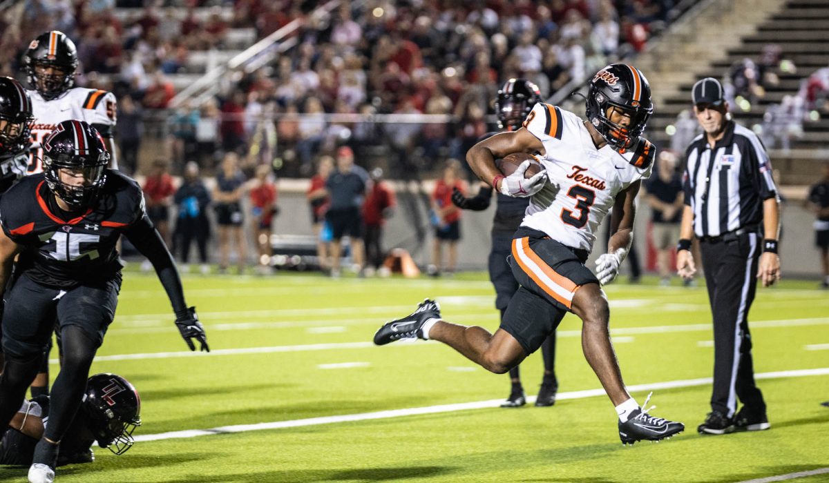 Seen as a Sophomore, Junior Tadarian Ball runs to a touchdown against Tyler Legacy Aug. 15, 2023.