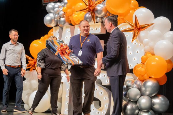 On Aug. 1, 2024 computer science teacher Mark Ahrens is honored for his achievement as Secondary Region 8 teacher of the year at the annual TISD Convocation in the Sullivan Performing Arts Center. Ahrens moved up to compete at the state level for teacher of the year. 