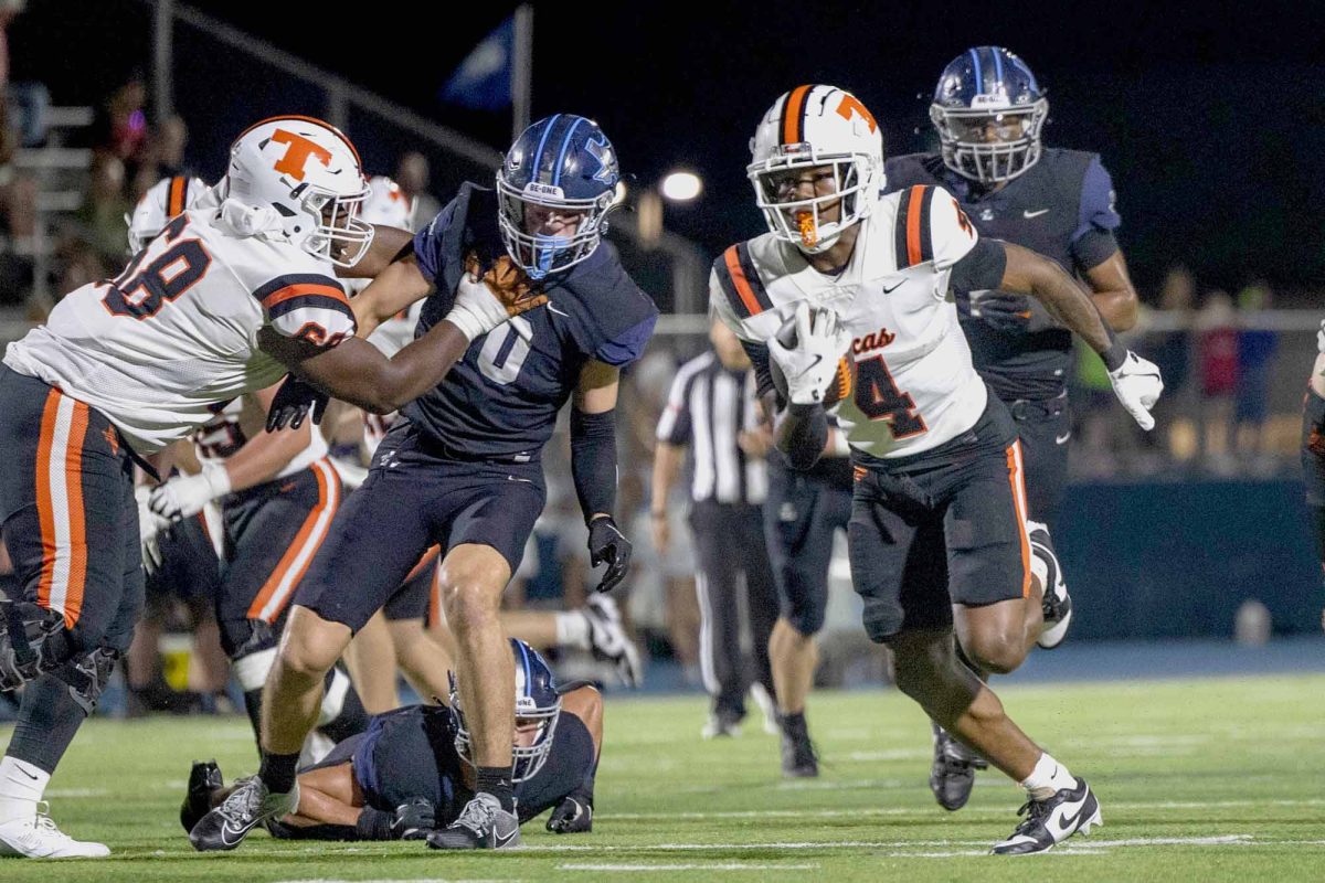 Javari Johnson runs the ball for the Texas Tigers. The Tigers won 52-35 against the Liberty Christian Warriors.