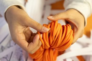 Leader-In-Me students count wristbands after the conclusion of their inaugural Rock-Paper-Scissors tournament. The competition aimed to promote the school's 2024-25 anti-violence campaign. 