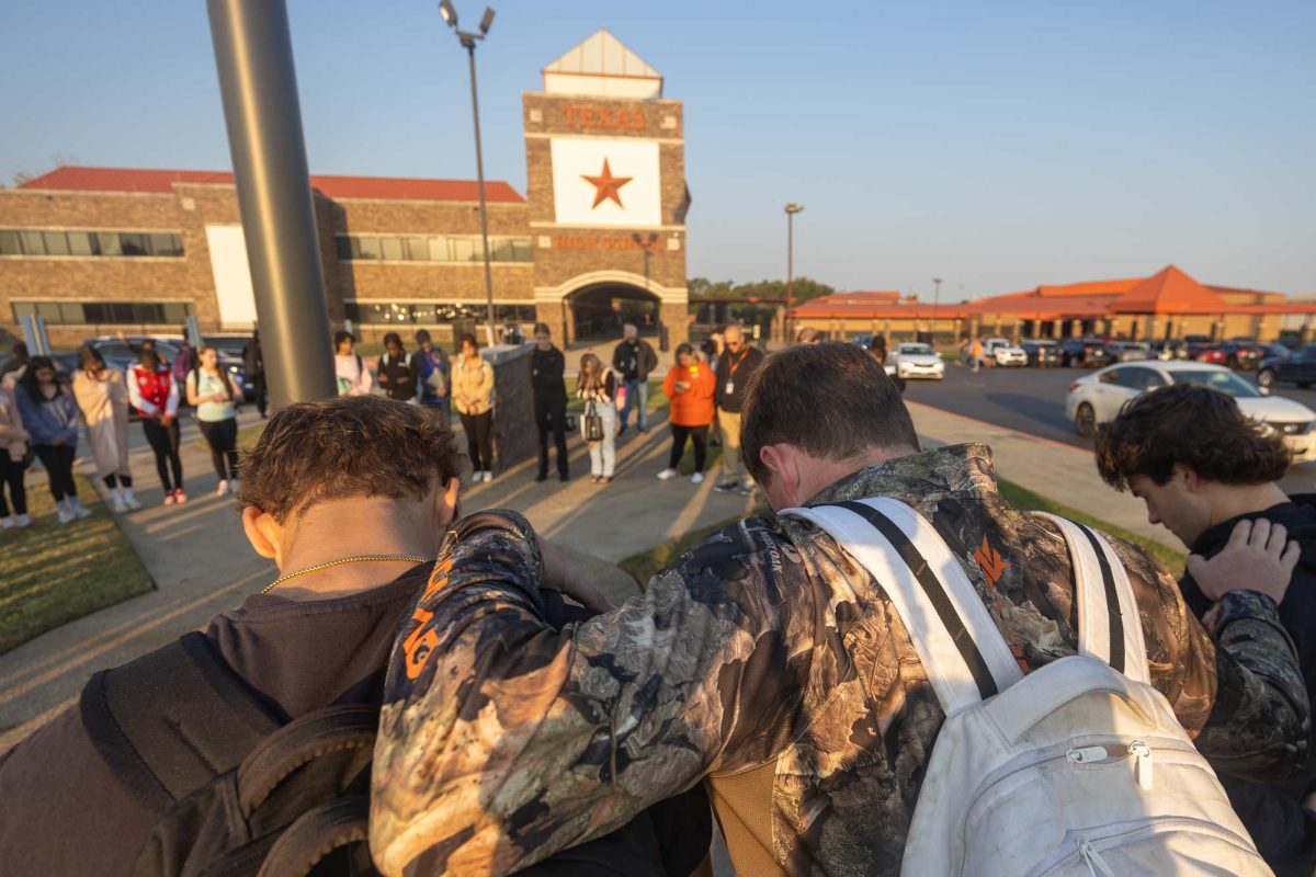 After no students or staff showed at the annual See You At The Pole Event on Sept. 25, 2024, members of the LIGHT Club and other students gathered at the flagpole in front of Texas High School on Oct. 9, 2024 to pray for their fellow students, teachers and their community.