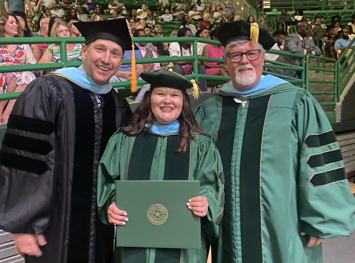 SUBMITTED PHOTO: Dr. Jaquelyn Smith  smiles after her graduation form Baylor University. After achieving two Masters degrees in Administration, Dr. Smith furthered her education and graduated with her doctorates in 2024. 