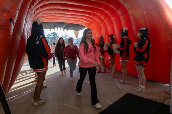 Upcoming freshmen from Red Lick and St. James walk through the Tiger Tunnel outside of the Sullivan Performing Arts Center. On Jan. 16, 2024, Texas High School provided Red Lick and St. James students to tour the campus grounds and experience THS before deciding upon enrollment. 