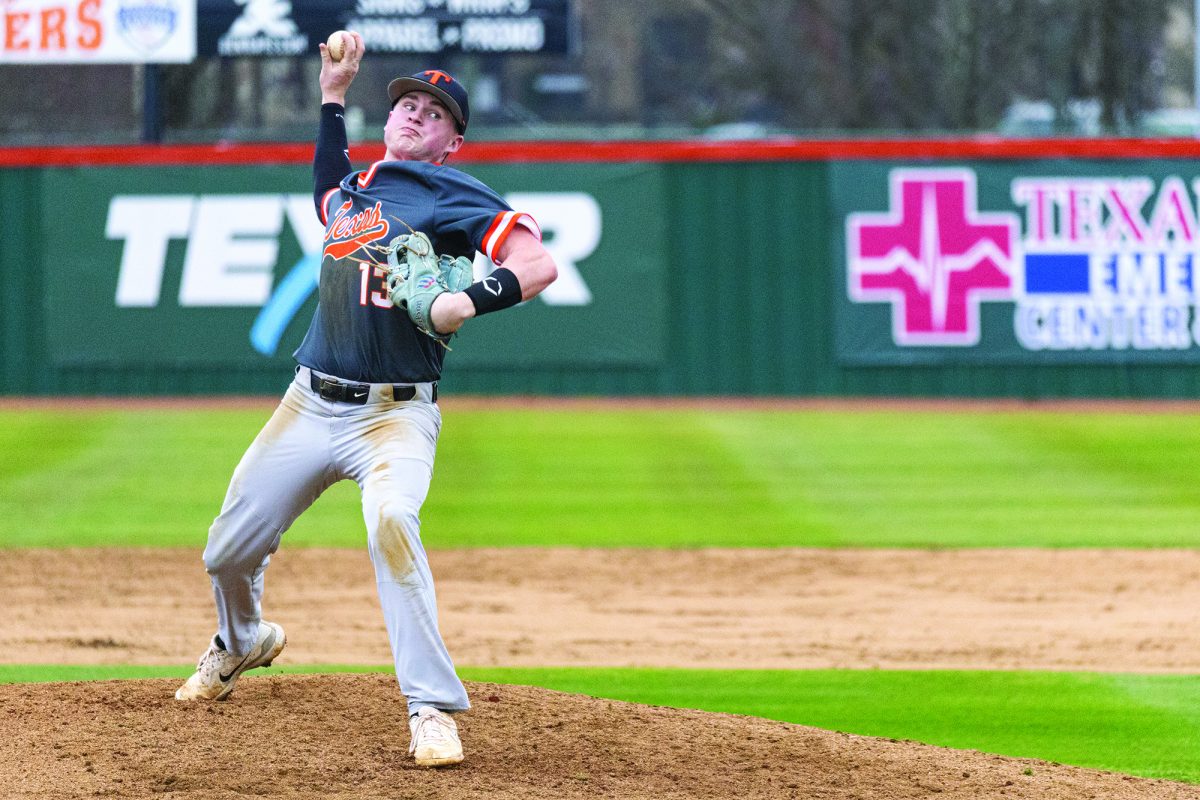 Jacob High throws a fast ball on the mound against the Evangel Eagles. the Tigers beat the Eagle 8-1 securing a win for the first game, Feb. 5, 2025.