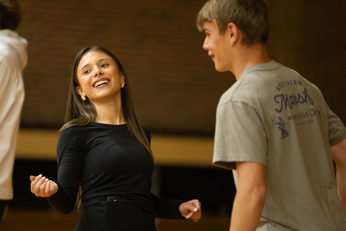 Junior Peyton Shaw laughs while rehearsing for Dinner Theatre. On March 22, 2025, Texas High School’s student council will put on its annual Dinner Theatre. This event takes place at the Tiger Stadium at Grim Park.